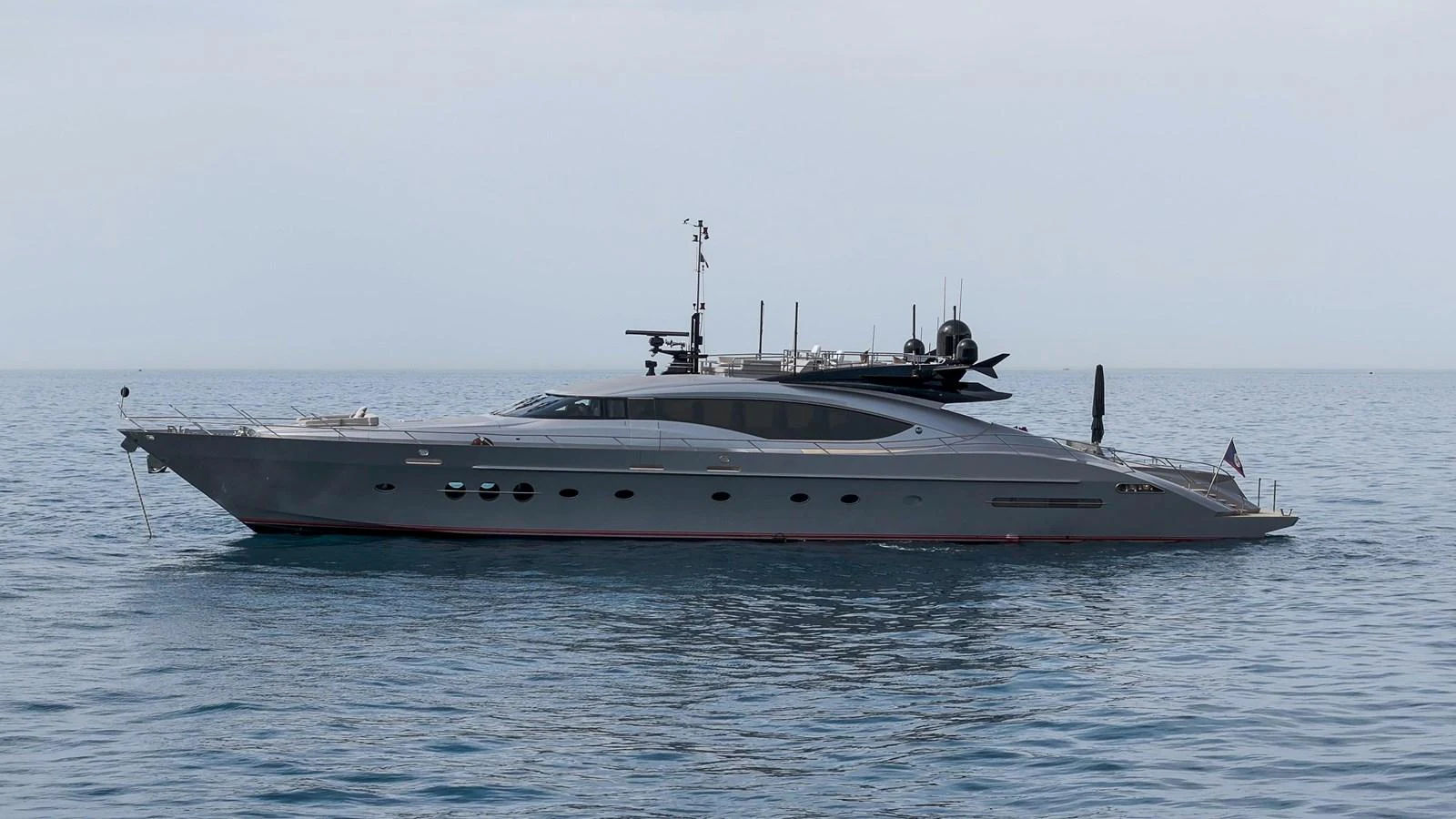 A sleek and modern yacht glides gracefully on calm waters. aboard BAGHEERA Yacht for Sale