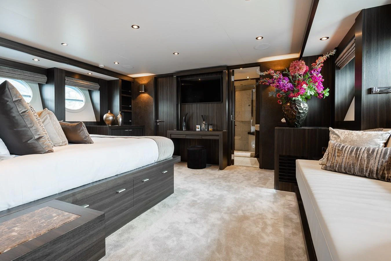 The master stateroom exudes luxury with its plush bedding, elegant decor, and spacious layout. aboard BAGHEERA Yacht for Sale