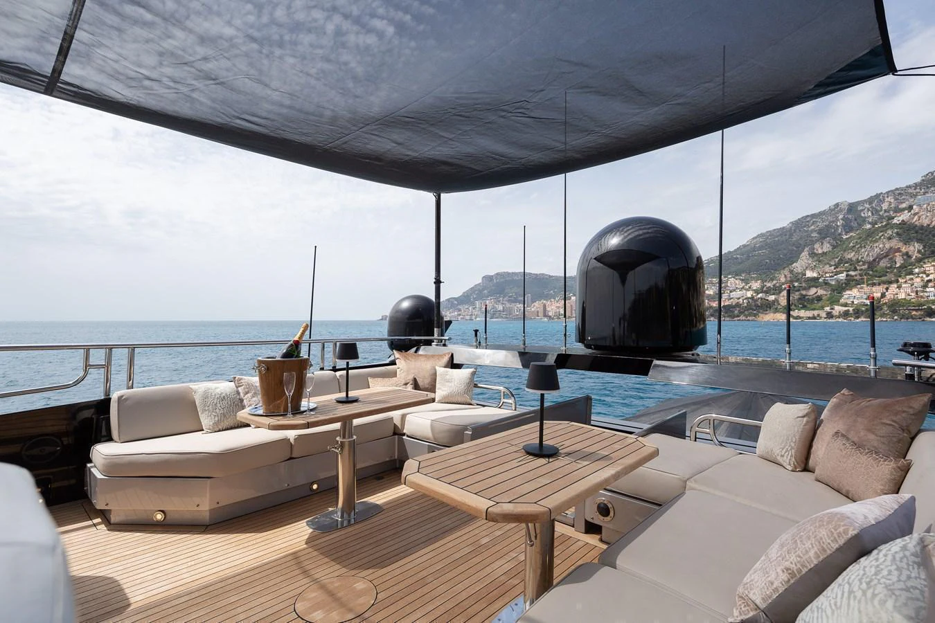 The sundeck offers a luxurious outdoor lounging area with comfortable seating and stunning sea views. aboard BAGHEERA Yacht for Sale