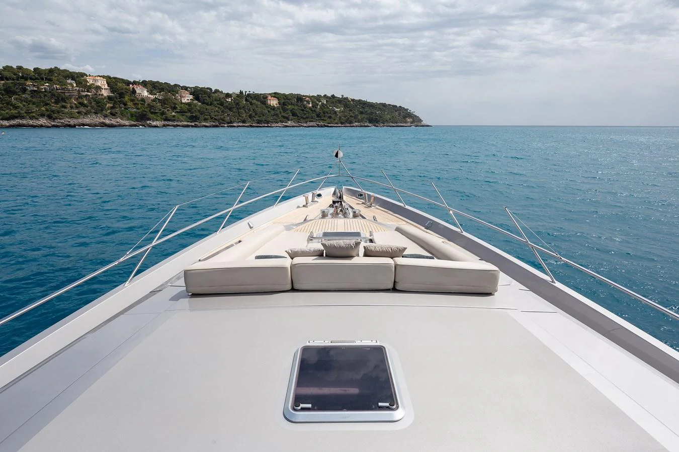The yacht's foredeck offers a spacious sunbathing area with plush cushions, perfect for relaxation while cruising. aboard BAGHEERA Yacht for Sale