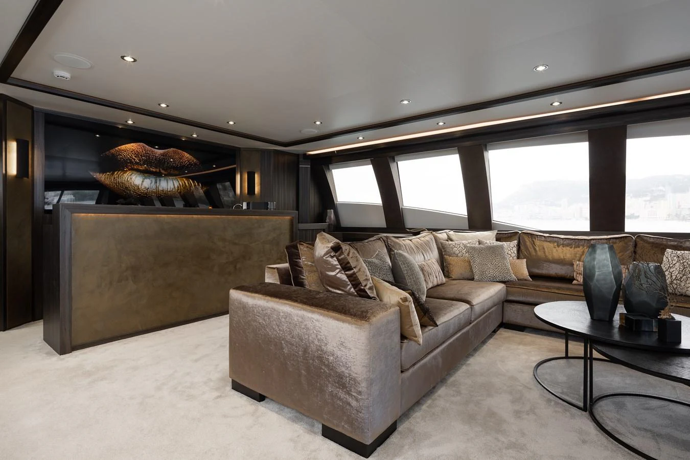 The salon features luxurious seating with plush cushions and modern decor, creating an inviting and elegant atmosphere. aboard BAGHEERA Yacht for Sale