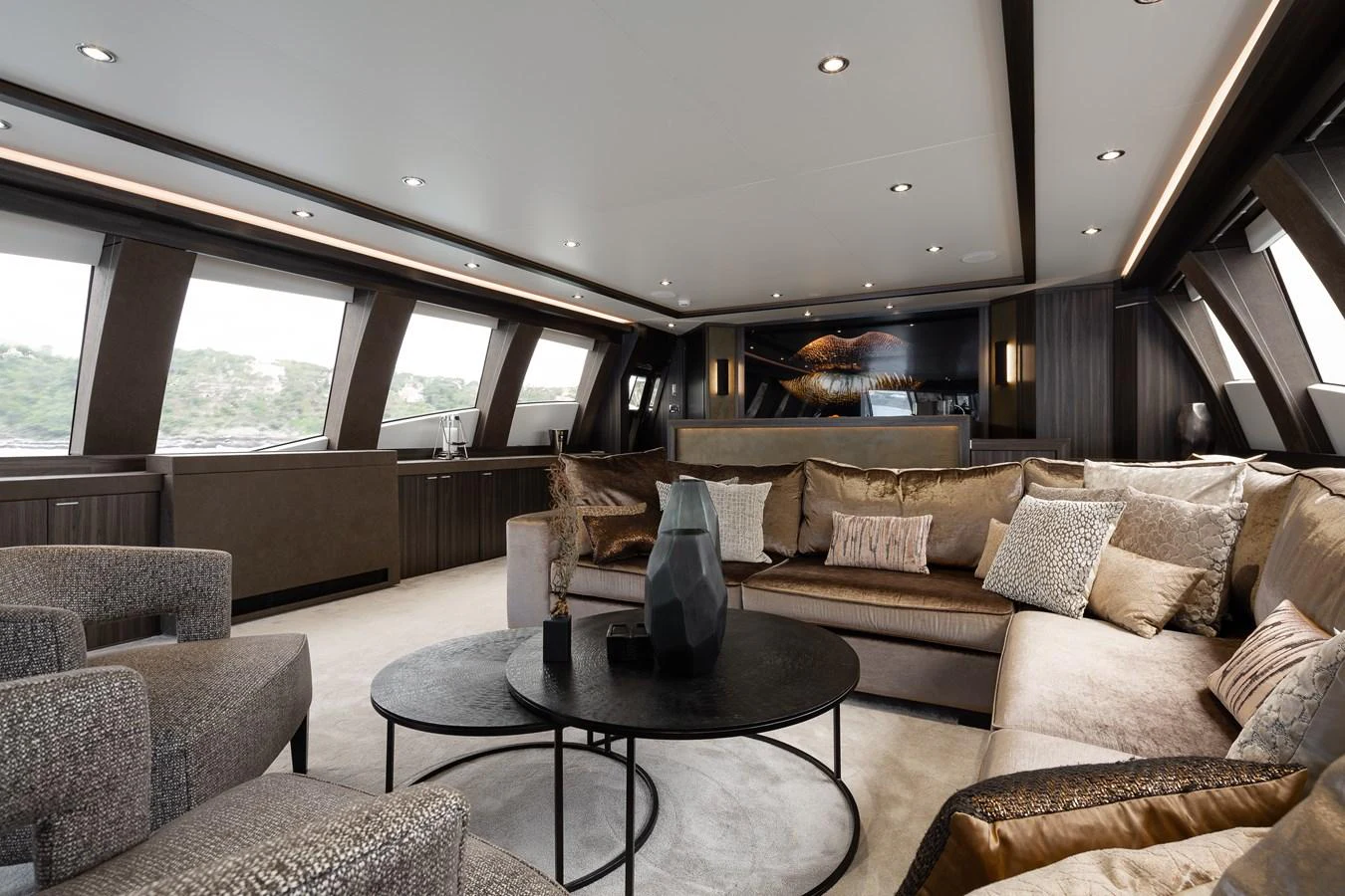 The yacht's salon features luxurious seating and elegant decor with ample natural light. aboard BAGHEERA Yacht for Sale