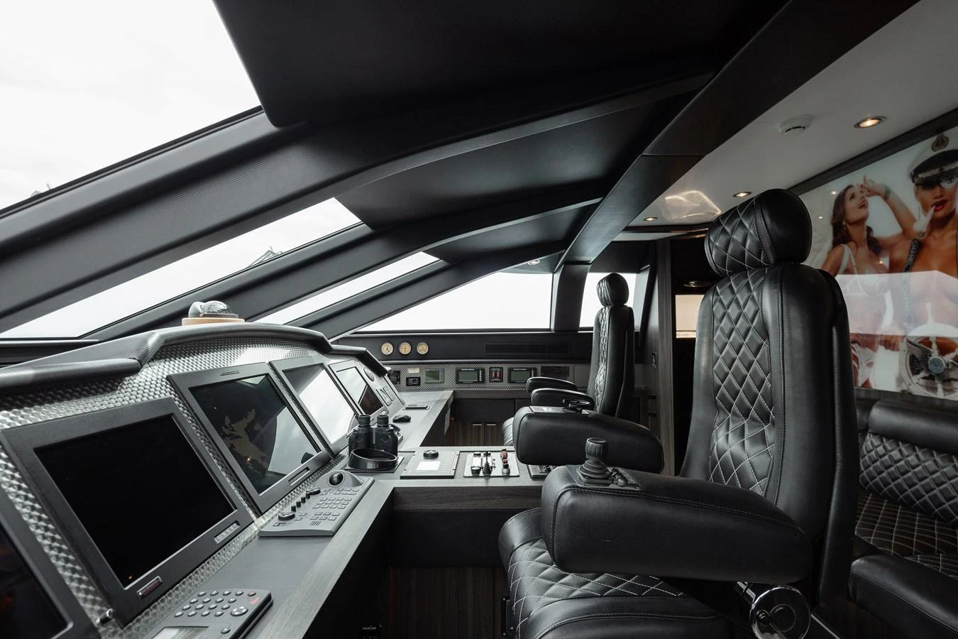 The helm station features advanced navigation equipment and luxurious seating. aboard BAGHEERA Yacht for Sale