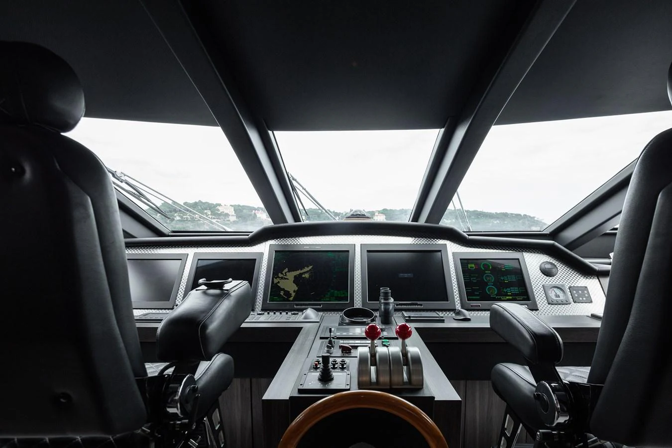 The helm station features advanced navigation equipment and comfortable seating for optimal control. aboard BAGHEERA Yacht for Sale
