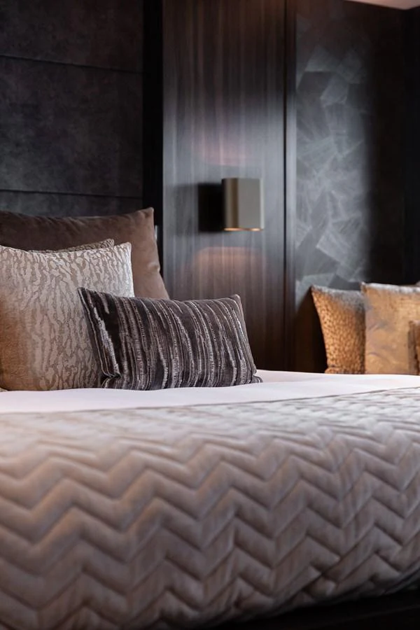 The stateroom features luxurious bedding and elegant decor, creating a serene and sophisticated atmosphere. aboard BAGHEERA Yacht for Sale