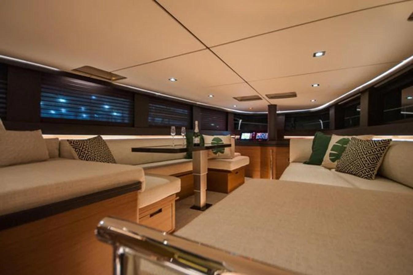 The saloon features comfortable seating with a modern and cozy ambiance. aboard 2025 MCP GLOBAL EXP 68 Yacht for Sale
