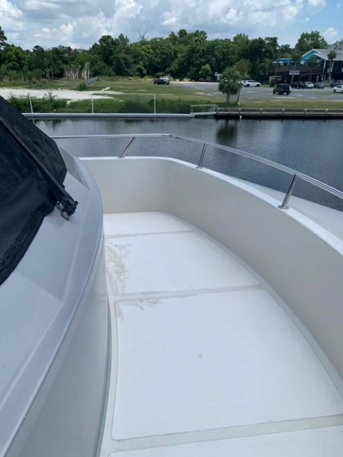 The bow of the yacht offers a spacious and clean area with a view of the surrounding water and landscape. aboard THE CAT FROM THE HAT Yacht for Sale