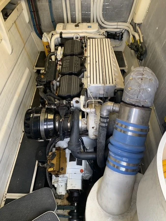 The image showcases the engine room of the yacht, featuring well-maintained machinery and components. aboard THE CAT FROM THE HAT Yacht for Sale