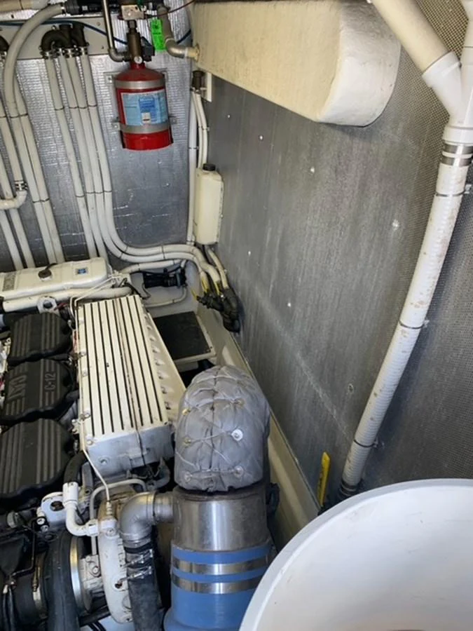 A view of the yacht's engine room showcasing the mechanical components and systems. aboard THE CAT FROM THE HAT Yacht for Sale