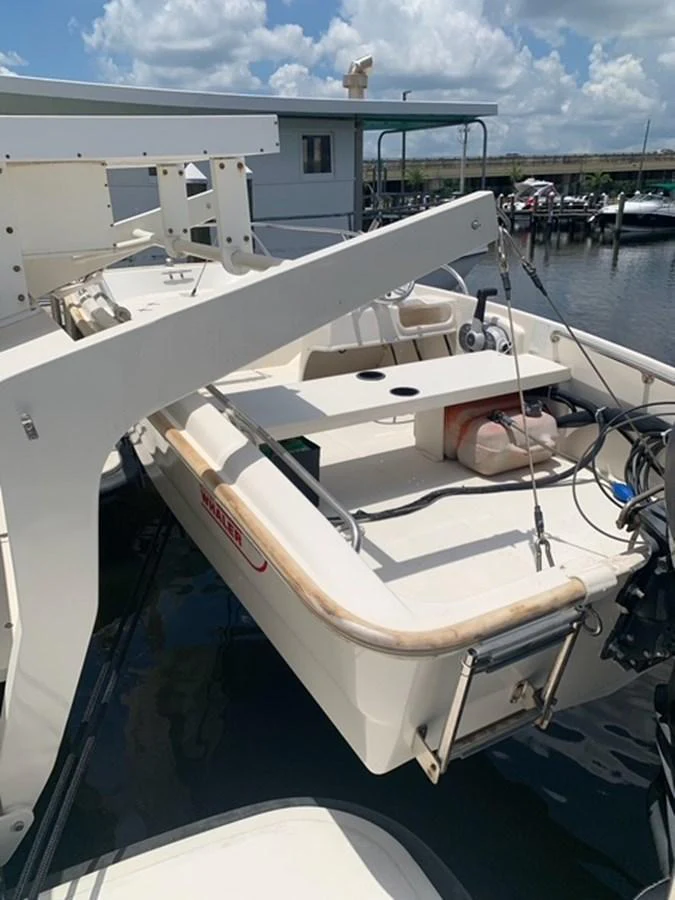 A tender is secured on a yacht, ready for deployment. aboard THE CAT FROM THE HAT Yacht for Sale