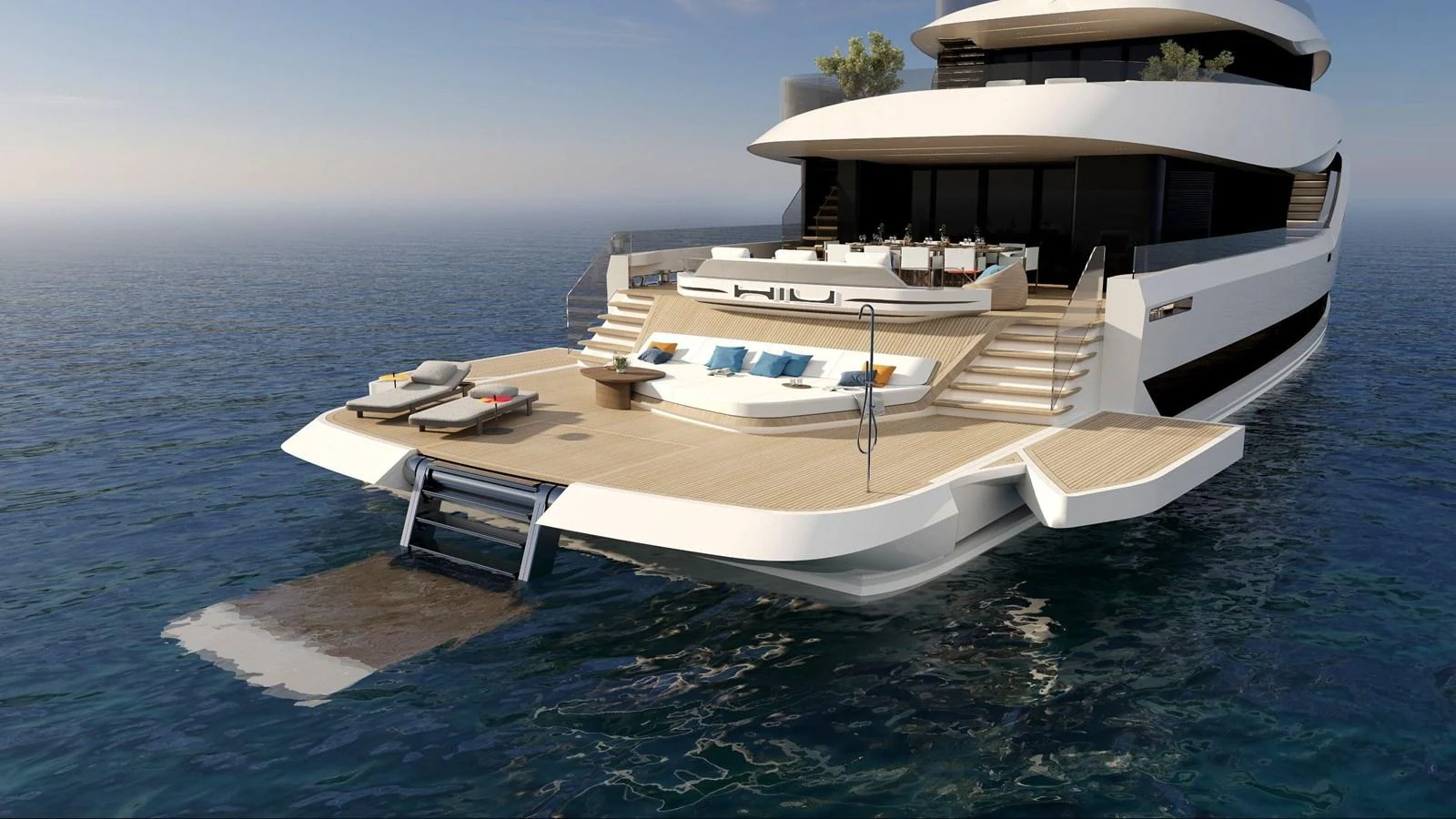 The yacht's aft deck features a luxurious lounging area with direct access to the water. aboard HIU Yacht for Sale