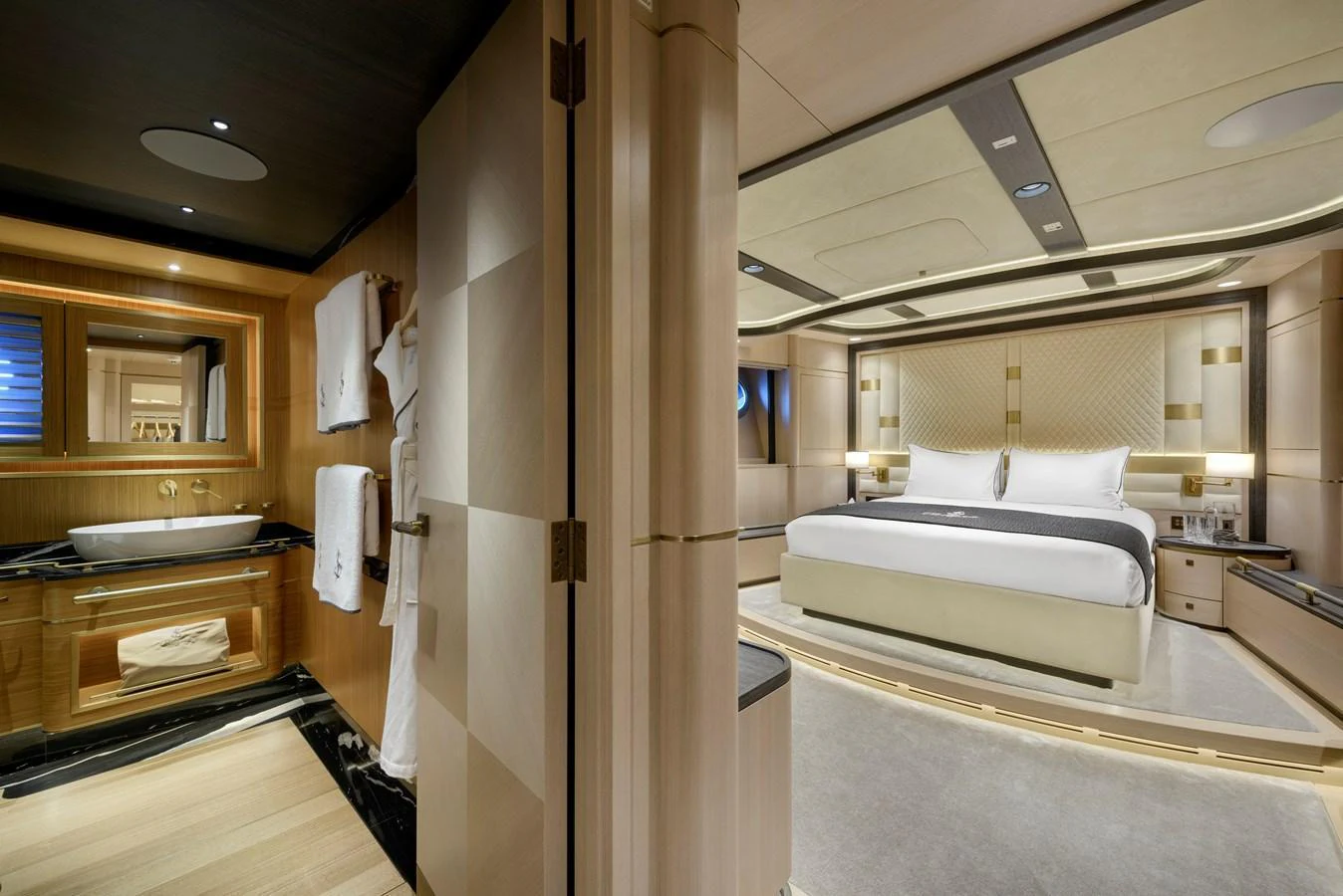 The master stateroom features a luxurious bed and an en-suite bathroom with elegant fixtures. aboard SALLYNA Yacht for Sale
