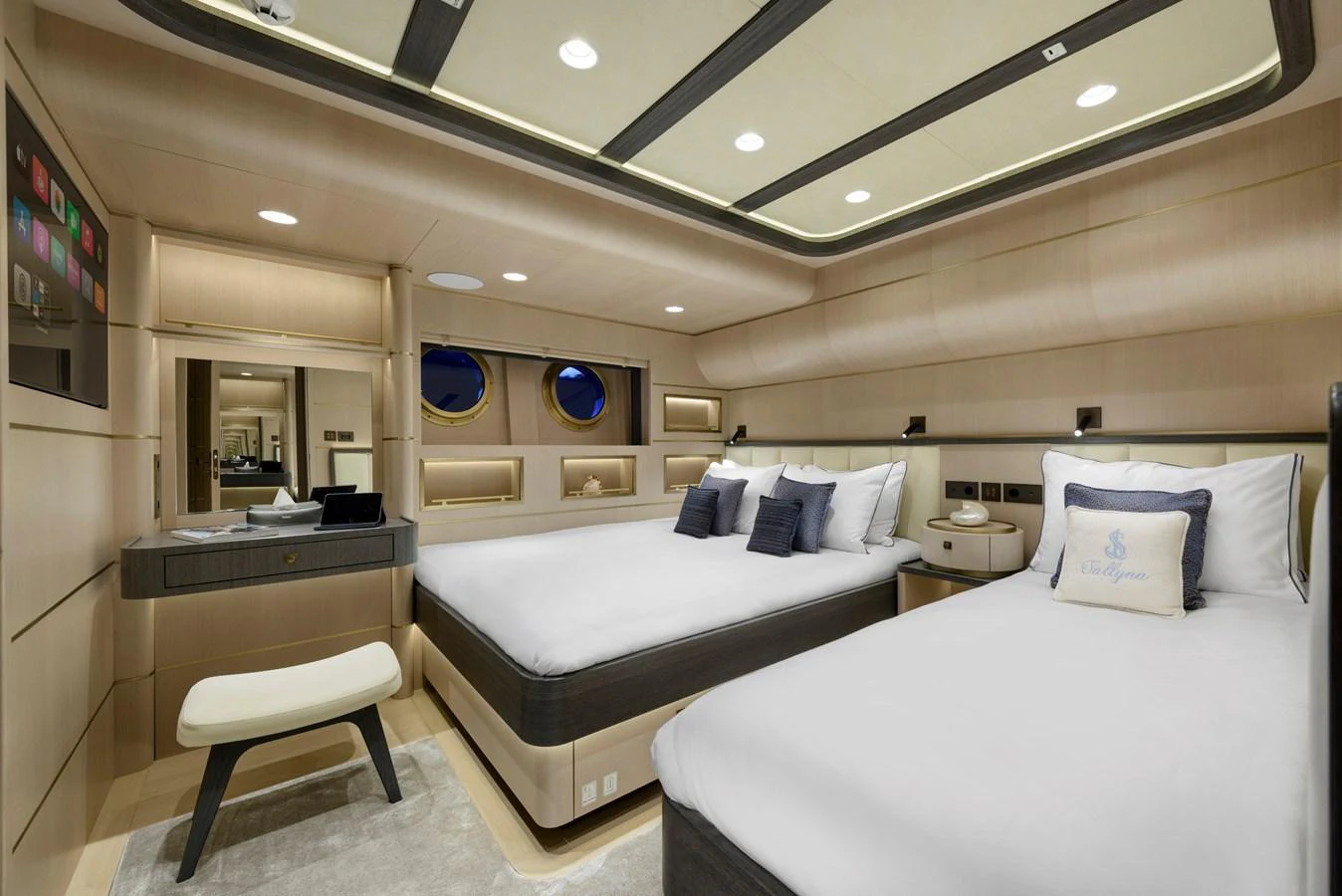 The guest stateroom offers a serene and luxurious retreat with twin beds and elegant decor. aboard SALLYNA Yacht for Sale
