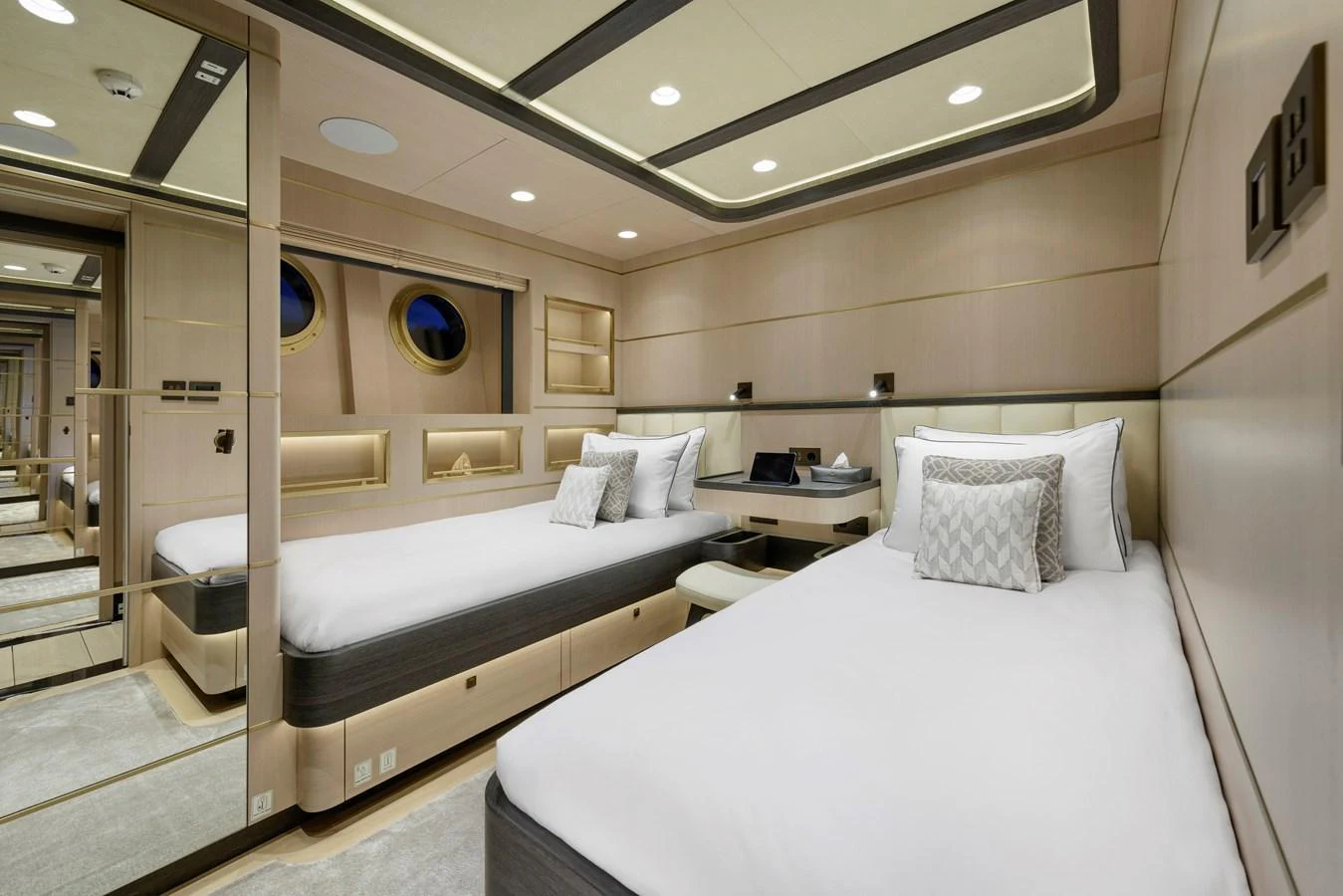 The twin stateroom offers a serene and luxurious retreat with modern design and ample lighting. aboard SALLYNA Yacht for Sale