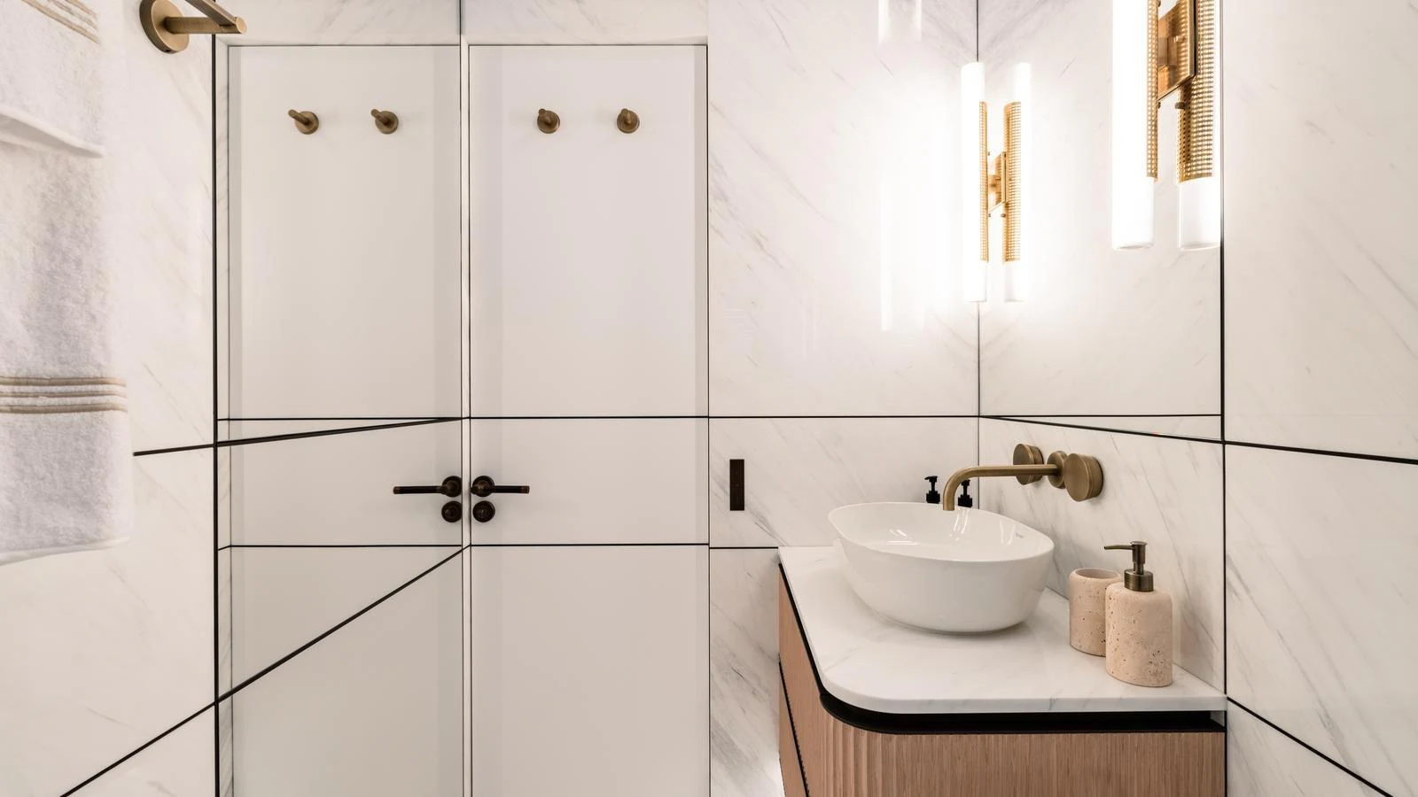 The yacht's bathroom features a sleek, modern design with elegant fixtures and a luxurious feel. aboard MIDNIGHT SAGA Yacht for Sale