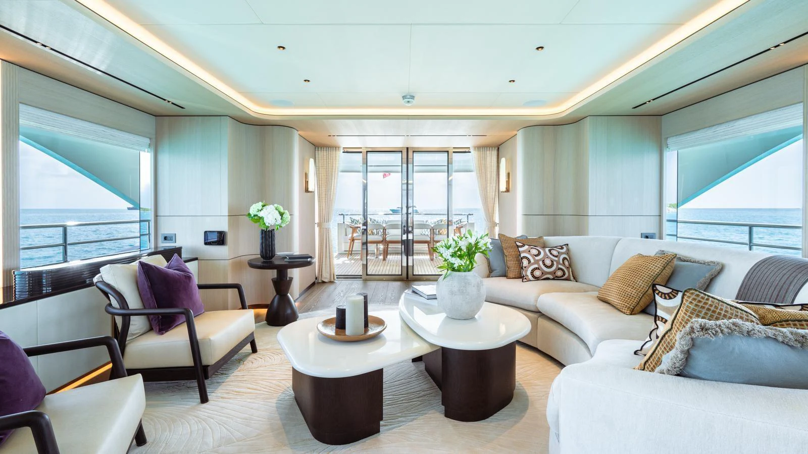 The salon offers a spacious and elegantly designed living area with panoramic views of the sea. aboard MIDNIGHT SAGA Yacht for Sale