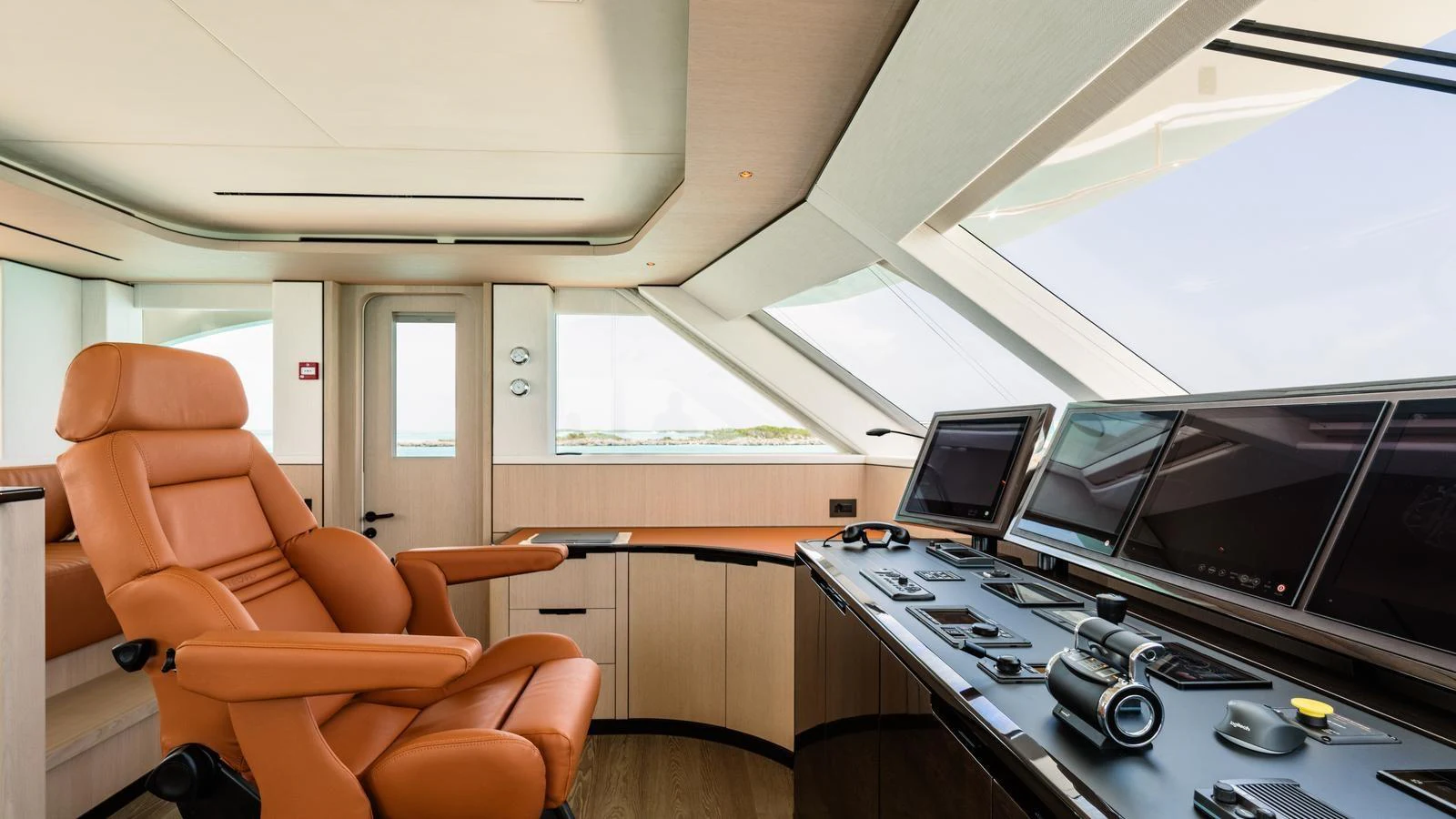 The helm station features state-of-the-art navigation equipment and a luxurious captain's chair with panoramic views. aboard MIDNIGHT SAGA Yacht for Sale