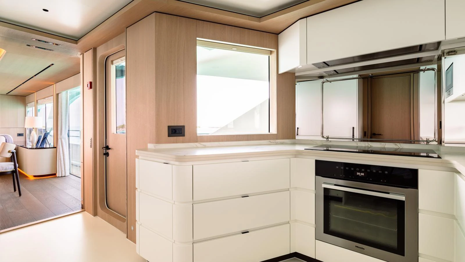 The yacht's galley features modern appliances and sleek cabinetry, creating a stylish and functional space. aboard MIDNIGHT SAGA Yacht for Sale