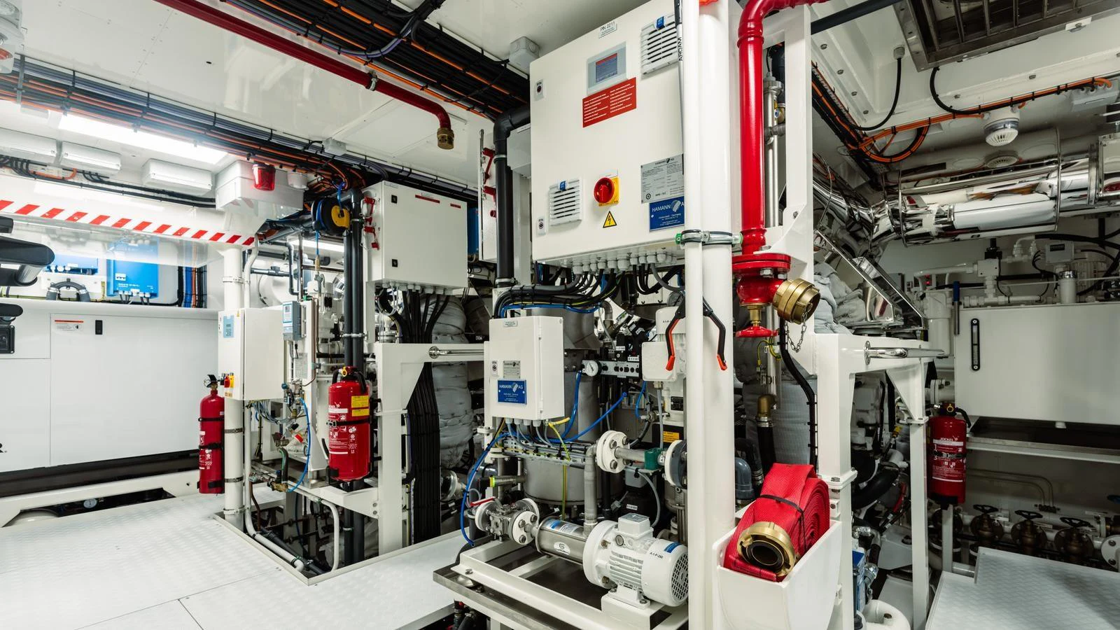 The yacht's engine room is equipped with advanced machinery and safety systems. aboard MIDNIGHT SAGA Yacht for Sale