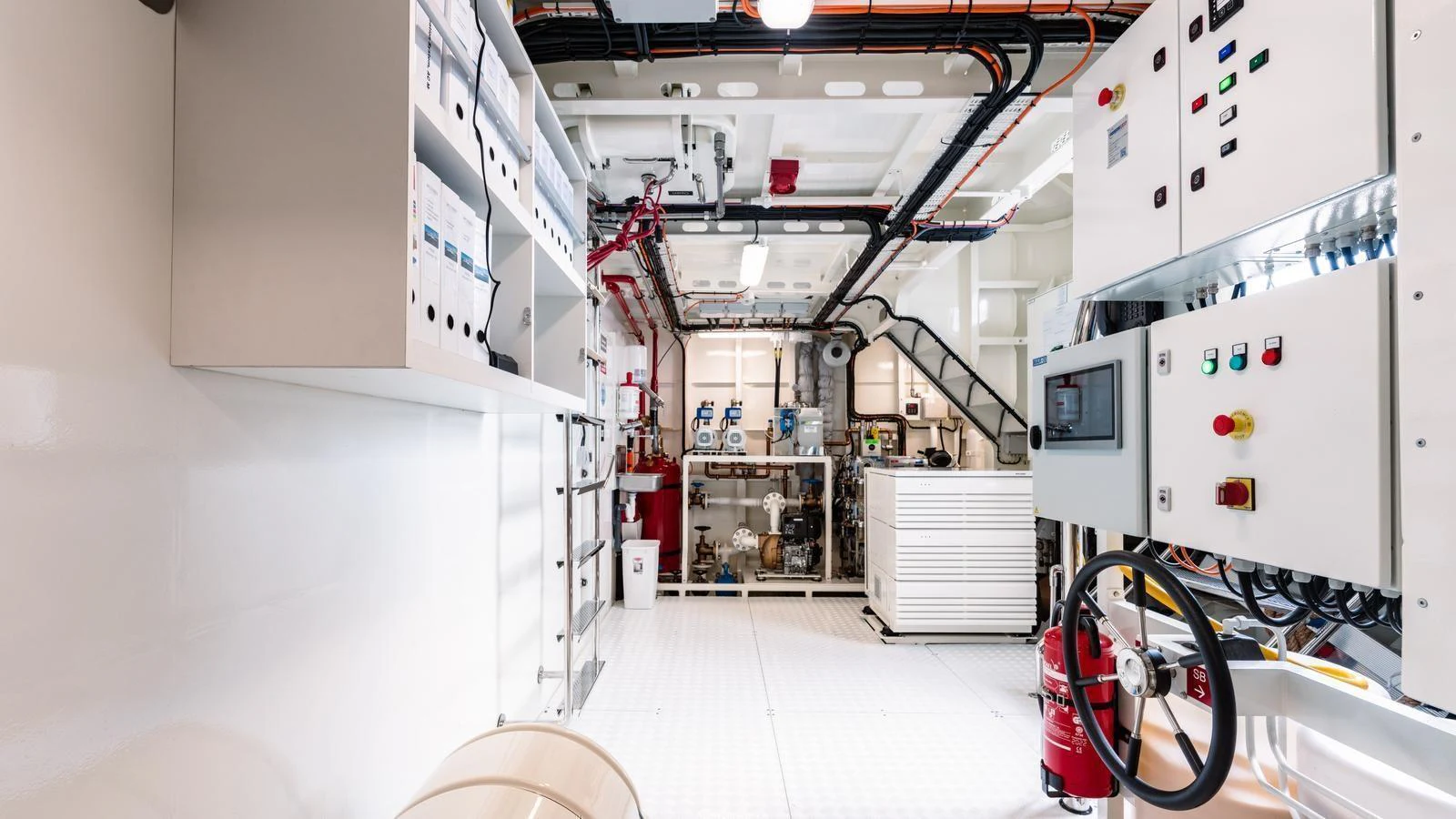 The yacht's engine room is equipped with advanced machinery and control panels, ensuring smooth and efficient operation. aboard MIDNIGHT SAGA Yacht for Sale