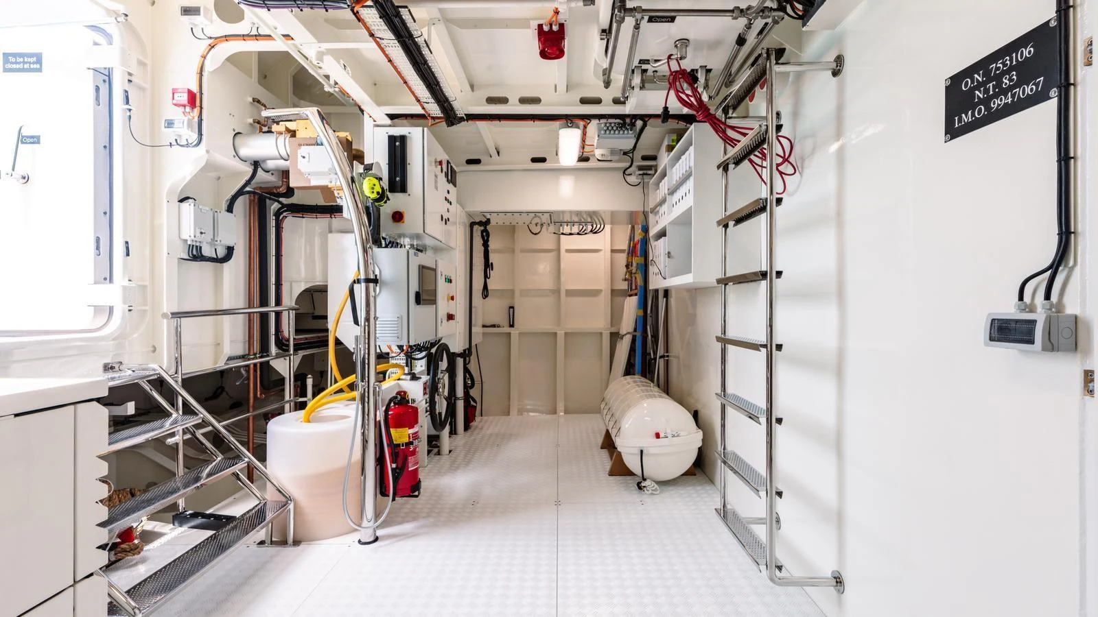 The yacht's engine room is well-organized and equipped with essential machinery and safety equipment. aboard MIDNIGHT SAGA Yacht for Sale