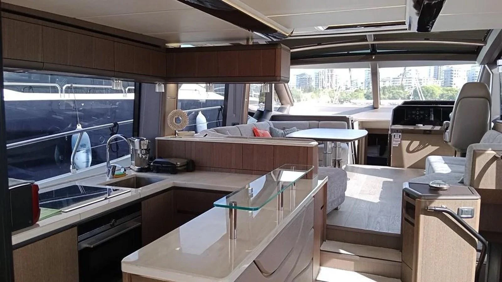 The yacht's galley is modern and well-equipped, seamlessly integrated with the dining and lounging areas. aboard VIRTUS Yacht for Sale