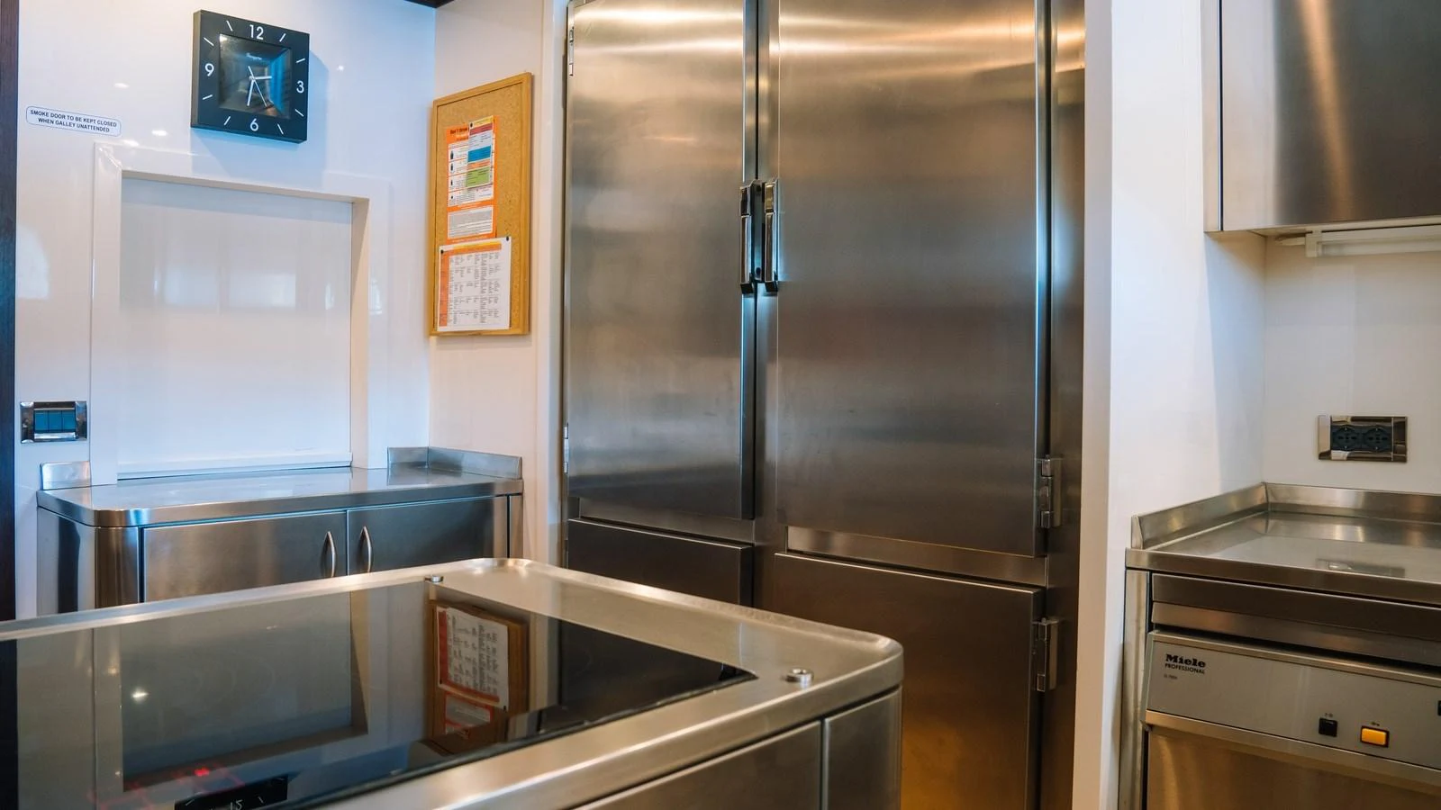 The yacht's galley features modern stainless steel appliances and ample workspace for gourmet meal preparation. aboard SEA PEARL Yacht for Sale