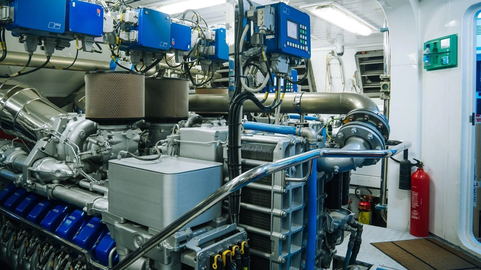 The image showcases the yacht's well-maintained engine room with advanced machinery and equipment. aboard SEA PEARL Yacht for Sale