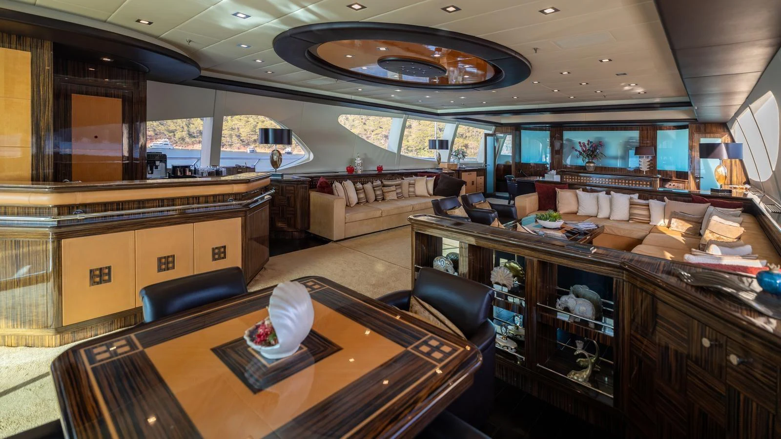 The salon features luxurious seating and elegant decor, perfect for relaxation and entertainment. aboard SEA PEARL Yacht for Sale
