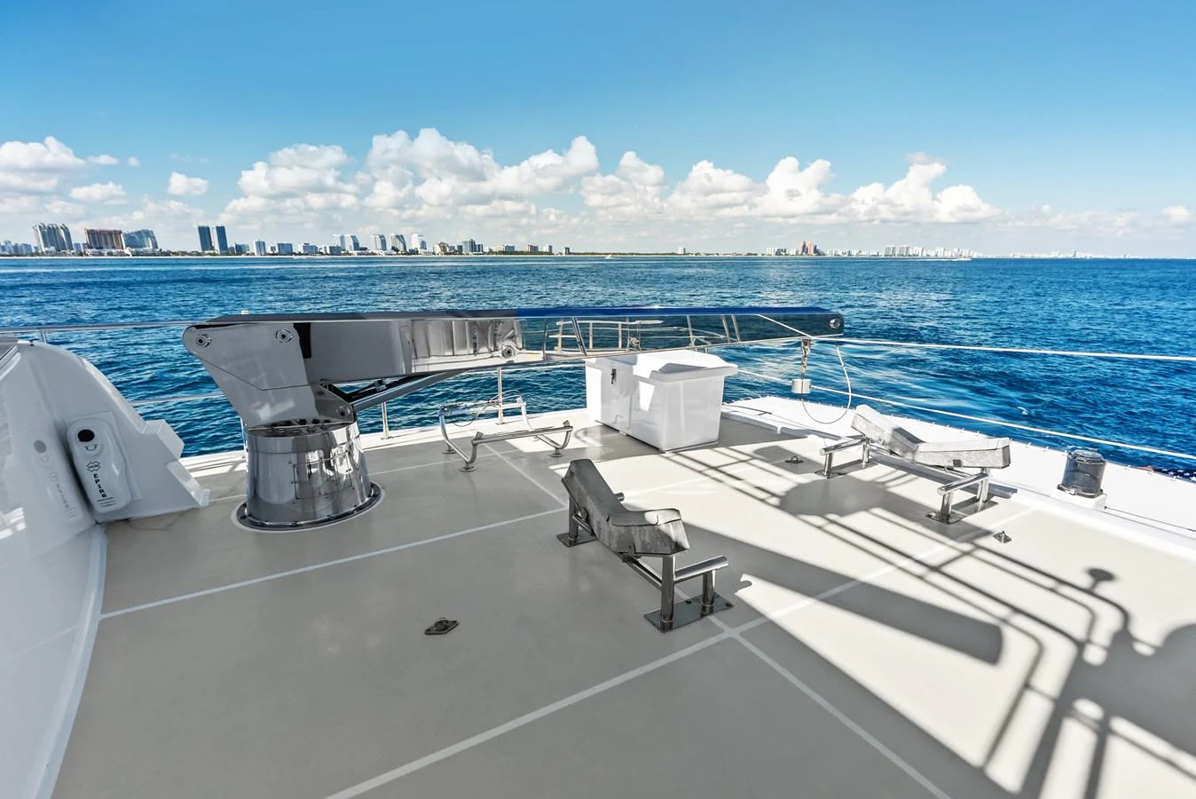 The yacht's deck offers a spacious and open area with stunning ocean views. aboard EL LEGADO Yacht for Sale