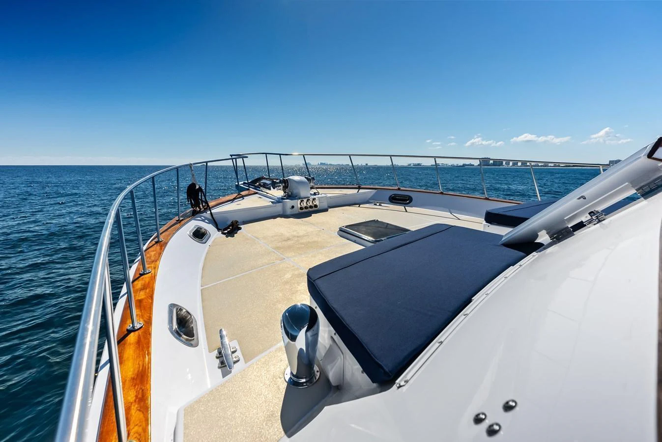 The foredeck offers ample space for relaxation with stunning ocean views. aboard EL LEGADO Yacht for Sale