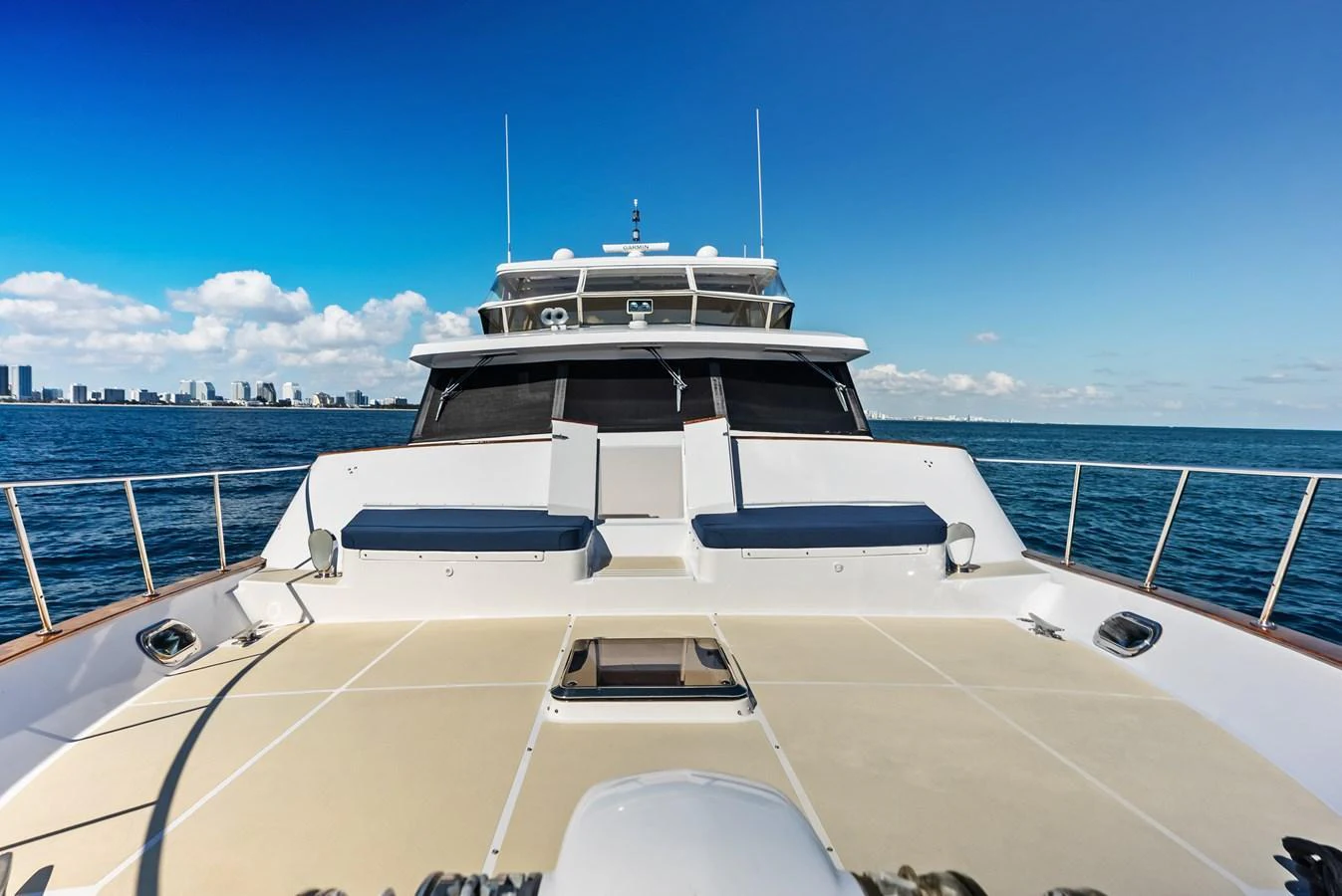 The yacht's foredeck offers ample space for relaxation with stunning ocean views. aboard EL LEGADO Yacht for Sale