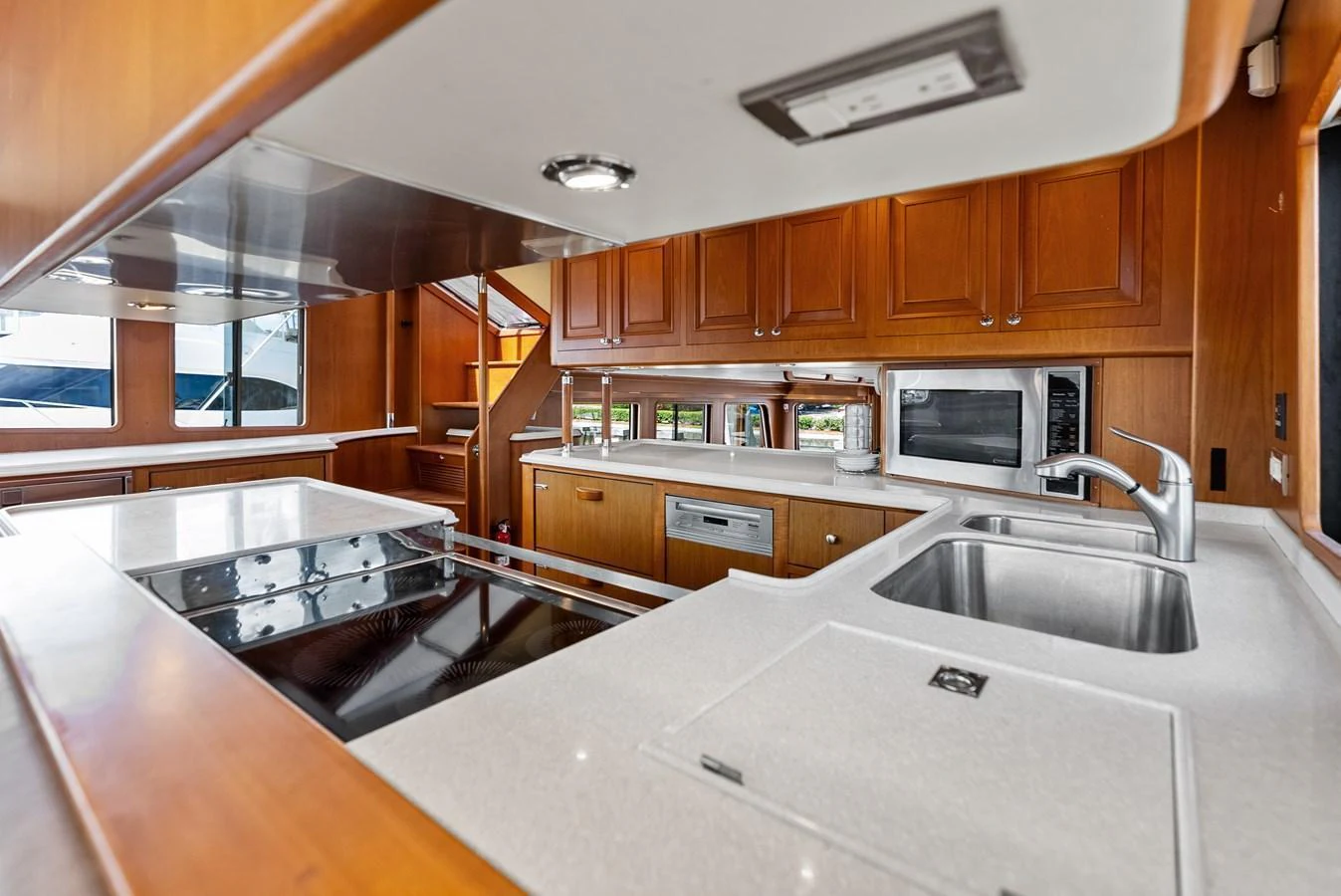 The yacht's galley is equipped with modern appliances and ample counter space, perfect for gourmet meal preparation. aboard EL LEGADO Yacht for Sale