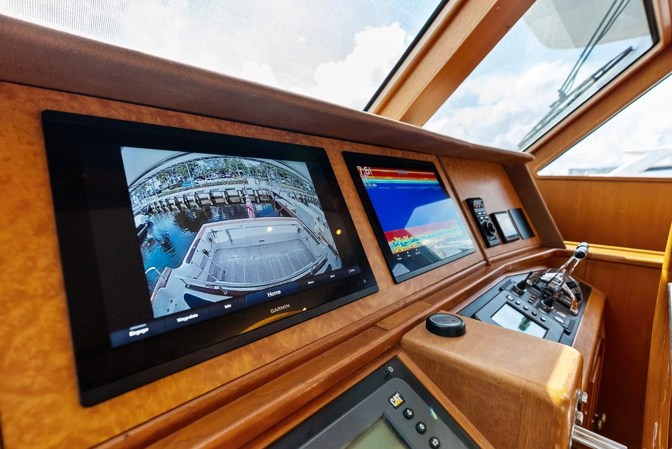 The helm features advanced navigation and monitoring systems for optimal control. aboard EL LEGADO Yacht for Sale