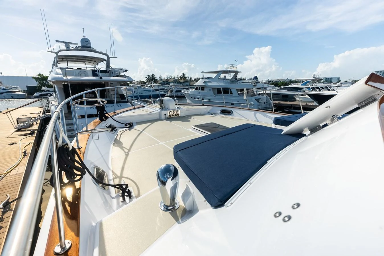 The foredeck of the yacht features spacious sun pads and a clean, modern design. aboard EL LEGADO Yacht for Sale