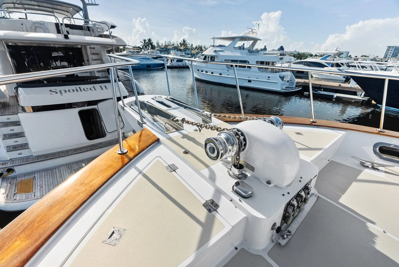 The foredeck features a well-maintained anchor winch and spacious sunbathing area. aboard EL LEGADO Yacht for Sale