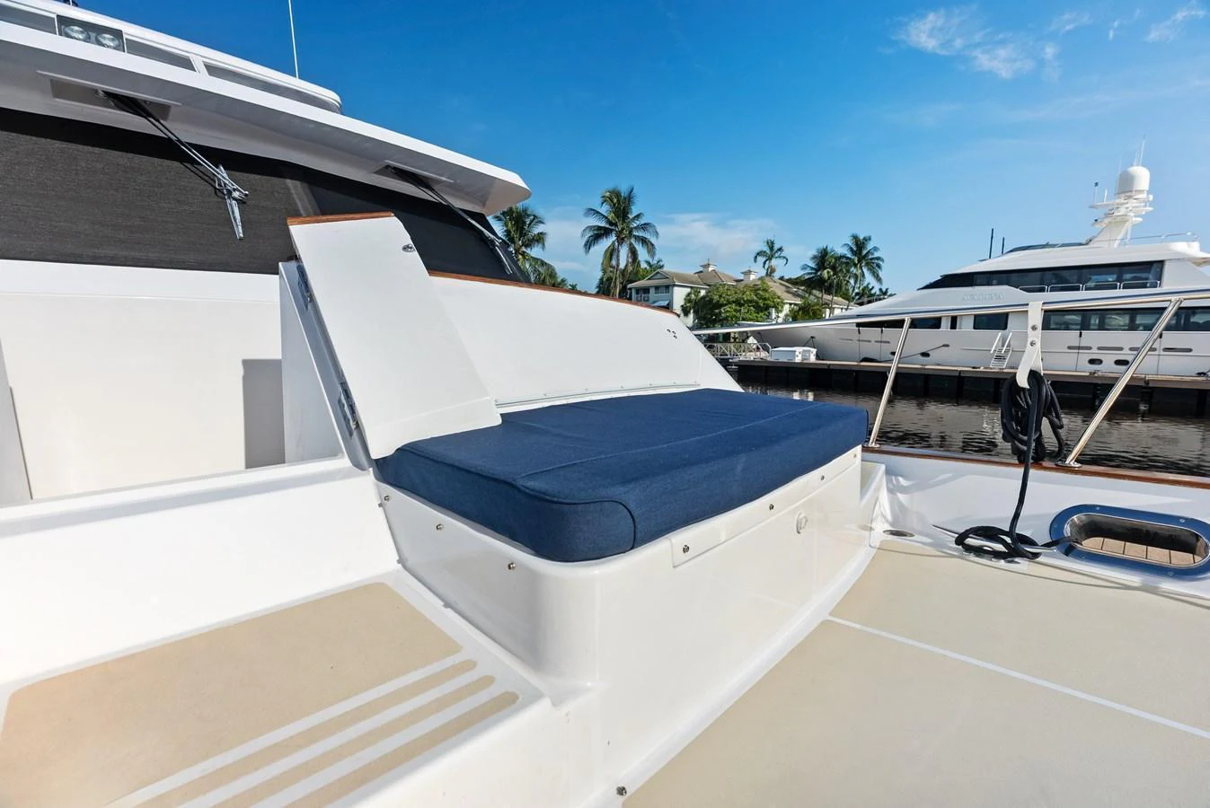 The yacht features a spacious and inviting outdoor lounging area with a comfortable sunpad. aboard EL LEGADO Yacht for Sale