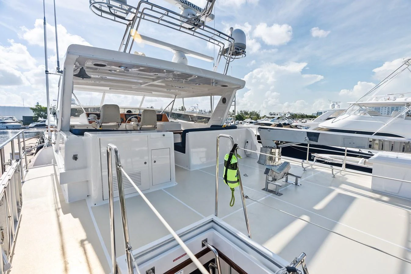The flybridge offers a spacious and open area for relaxation and navigation. aboard EL LEGADO Yacht for Sale