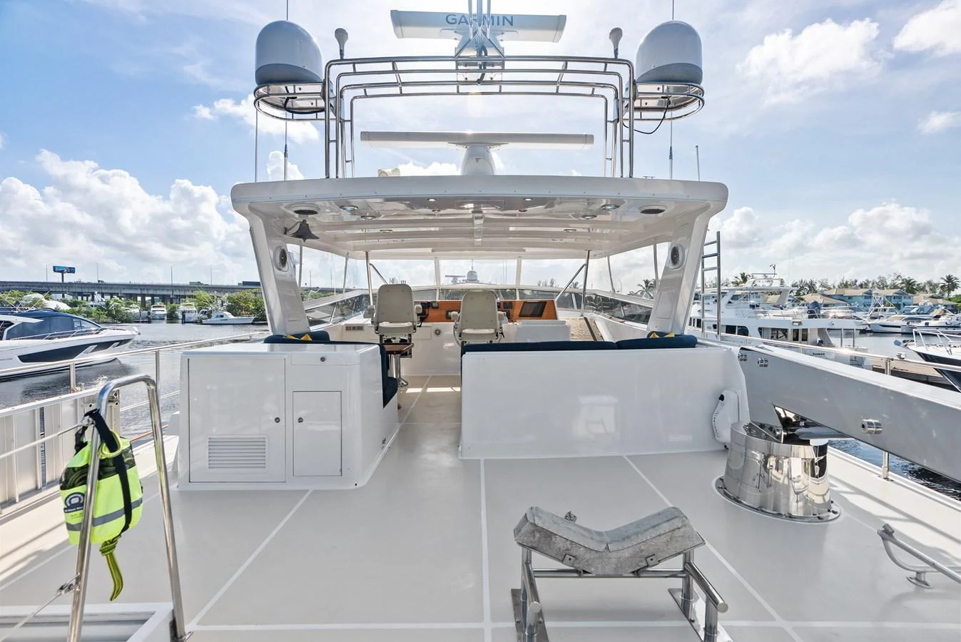 The yacht's flybridge offers a spacious and well-equipped area for navigation and relaxation. aboard EL LEGADO Yacht for Sale