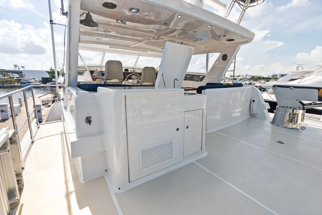 The flybridge offers a spacious and well-equipped area for relaxation and navigation. aboard EL LEGADO Yacht for Sale