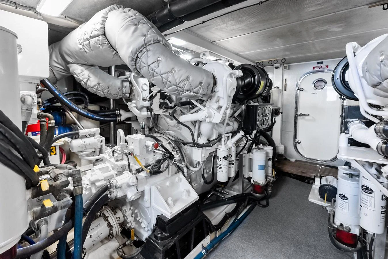The yacht's engine room showcases advanced mechanical systems and equipment. aboard EL LEGADO Yacht for Sale