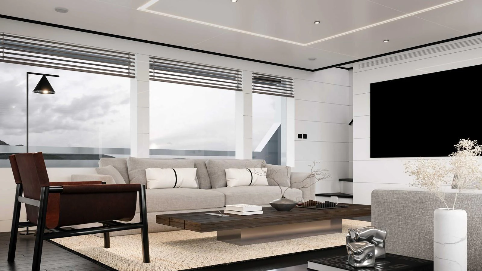The salon features modern furnishings with a comfortable seating area and large windows offering ample natural light. aboard MAKO SHARK Yacht for Sale