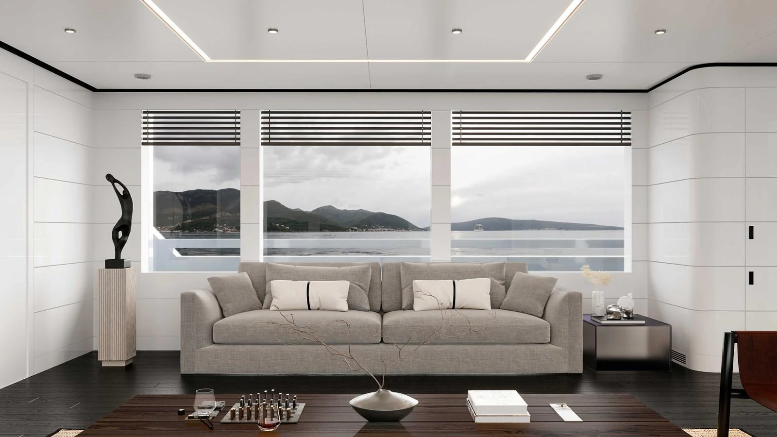 A luxurious yacht interior featuring a comfortable seating area with a stunning view of the sea. aboard MAKO SHARK Yacht for Sale