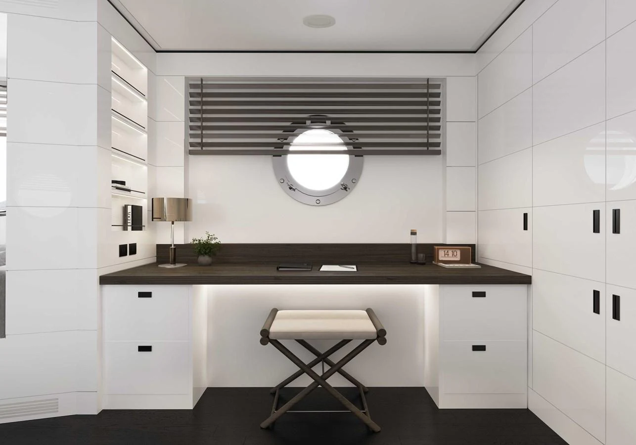 A sleek and modern yacht office with a porthole window and minimalist decor. aboard MAKO SHARK Yacht for Sale