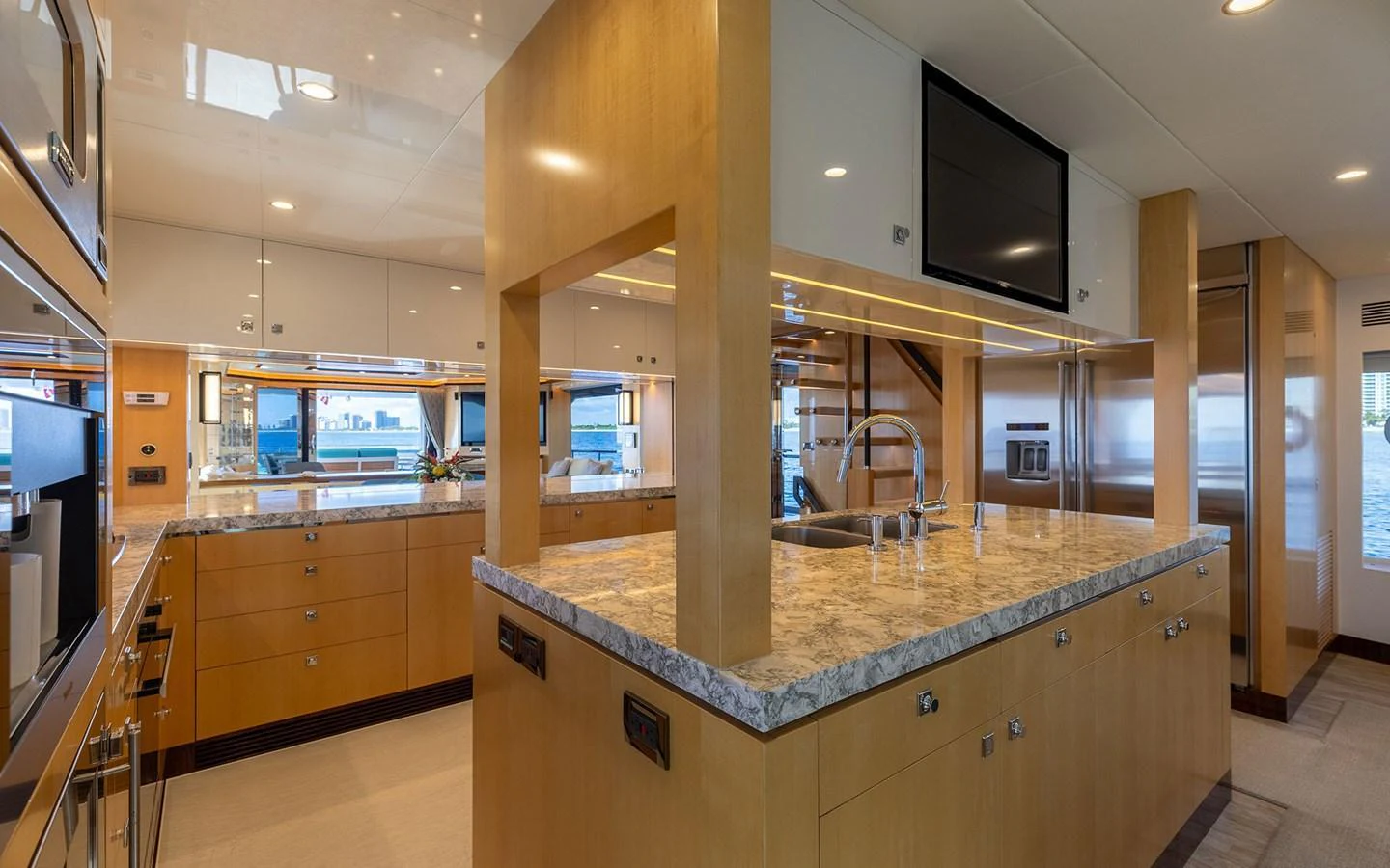 The galley features modern appliances and ample counter space with a stylish, contemporary design. aboard WADDLE WE DO Yacht for Sale