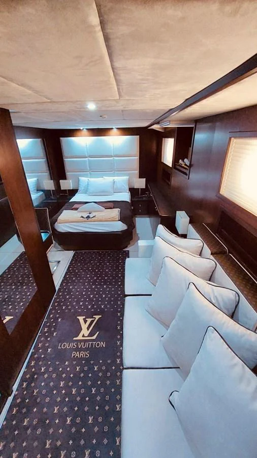 The luxurious stateroom features a plush bed and elegant decor, creating a serene retreat on the water. aboard 23 M MOTORSAILOR Yacht for Sale