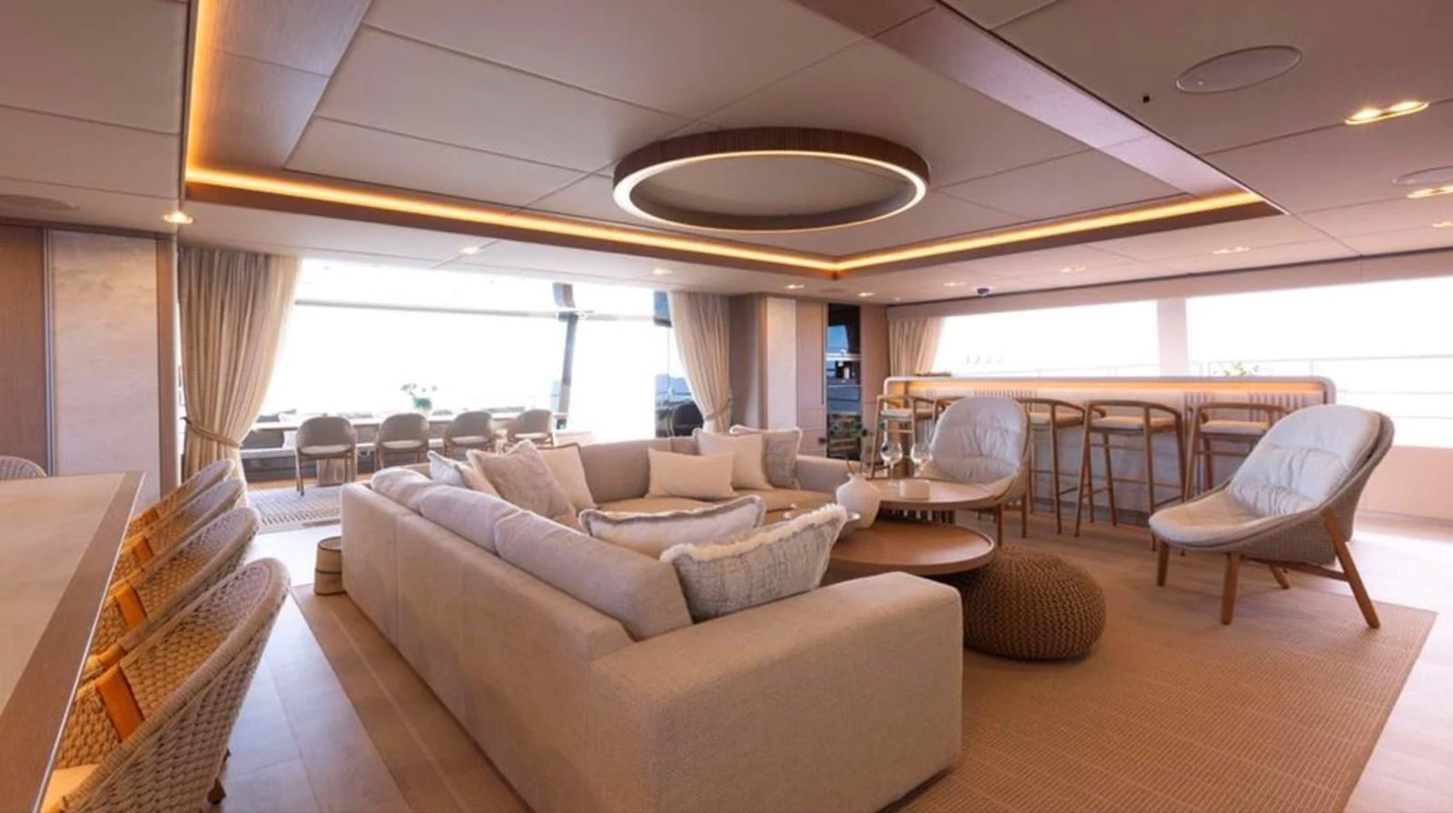 The yacht's salon features a spacious and elegantly designed seating area with modern furnishings and ample natural light. aboard TWILIGHT Yacht for Sale