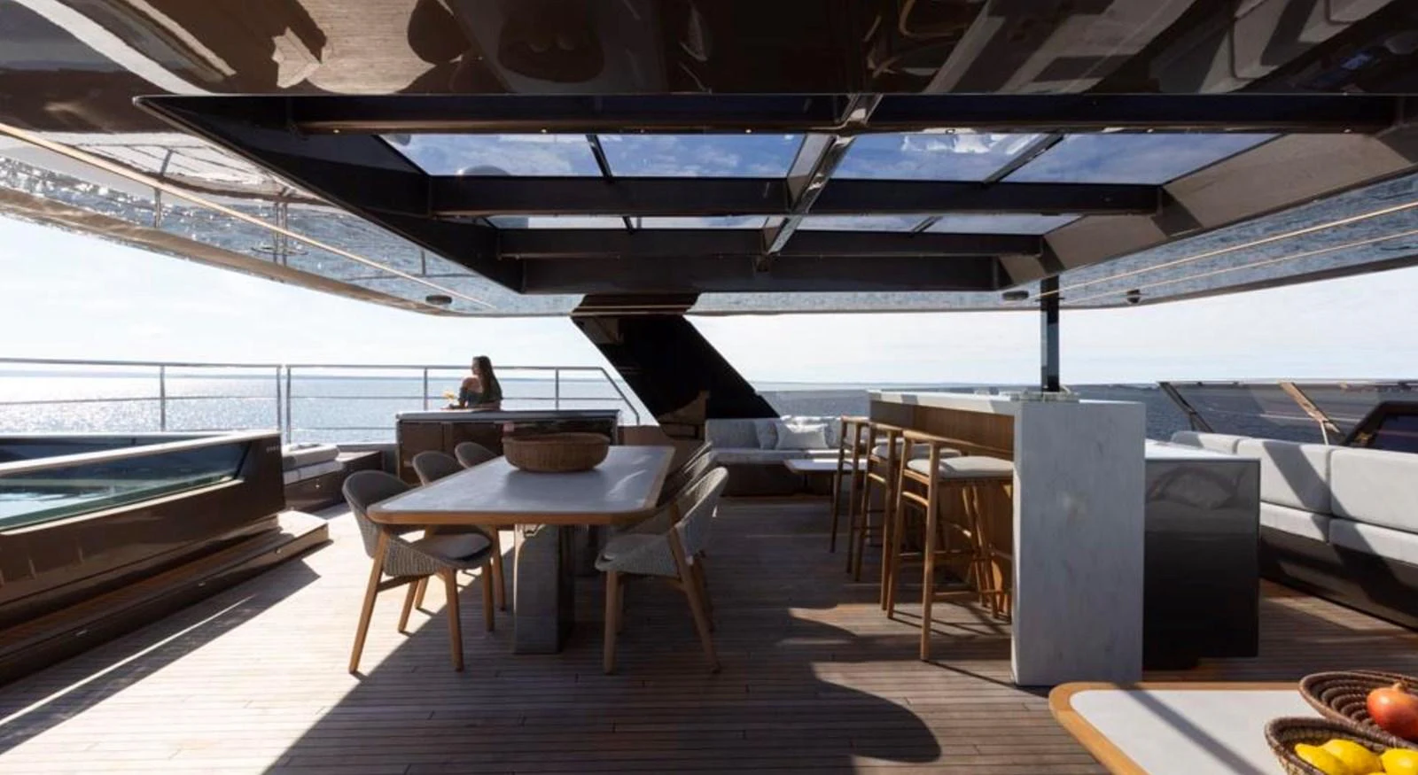 The sundeck offers a spacious and luxurious area for dining and relaxation with stunning sea views. aboard TWILIGHT Yacht for Sale