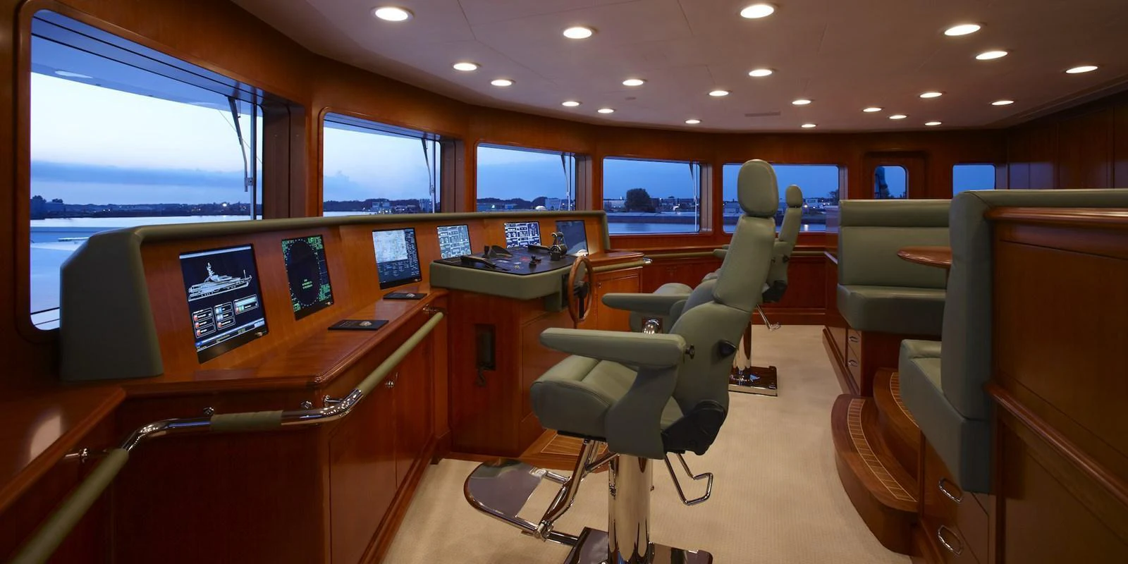 The helm station features state-of-the-art navigation equipment and luxurious seating with panoramic views. aboard LADY CHRISTINE Yacht for Sale