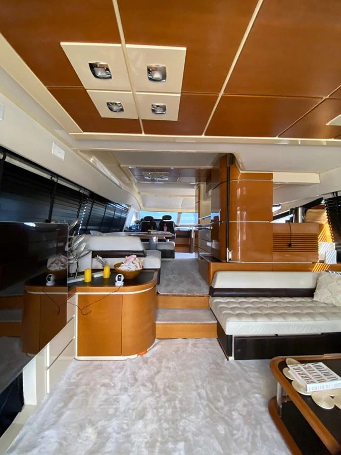 The yacht's interior features a luxurious and spacious living area with modern furnishings and ample natural light. aboard NE SEL Yacht for Sale